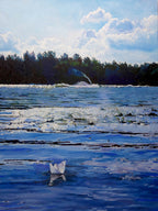 Paper boat floating on water with a forest and blue sky in the background