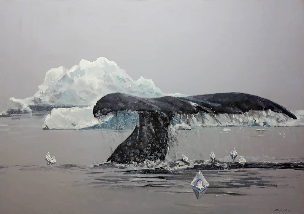 Whale tail emerging from water with icebergs in the background