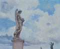 Statue of an angel against a cloudy sky