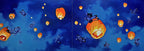 Two panels showing lanterns and bats in a night sky with a blue background.