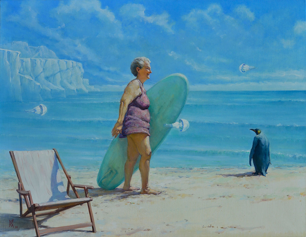 Woman with a surfboard on a beach with a penguin and chair in the foreground