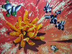 Artistic depiction of a yellow flower-like structure with blue and green spherical objects on a red and orange background.