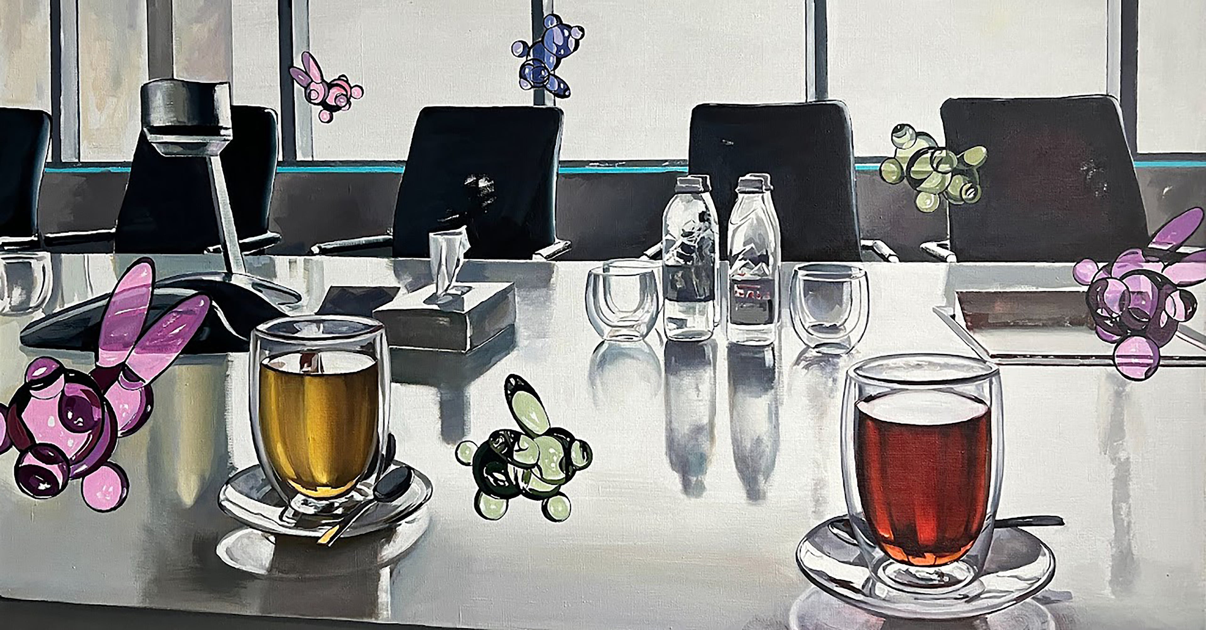 Conference room with a round table, chairs, and decorative elements.