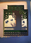 Decorative wall art with geometric patterns and butterfly silhouettes on a gradient background