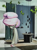 Person holding a large pink object in a modern interior setting with butterflies.