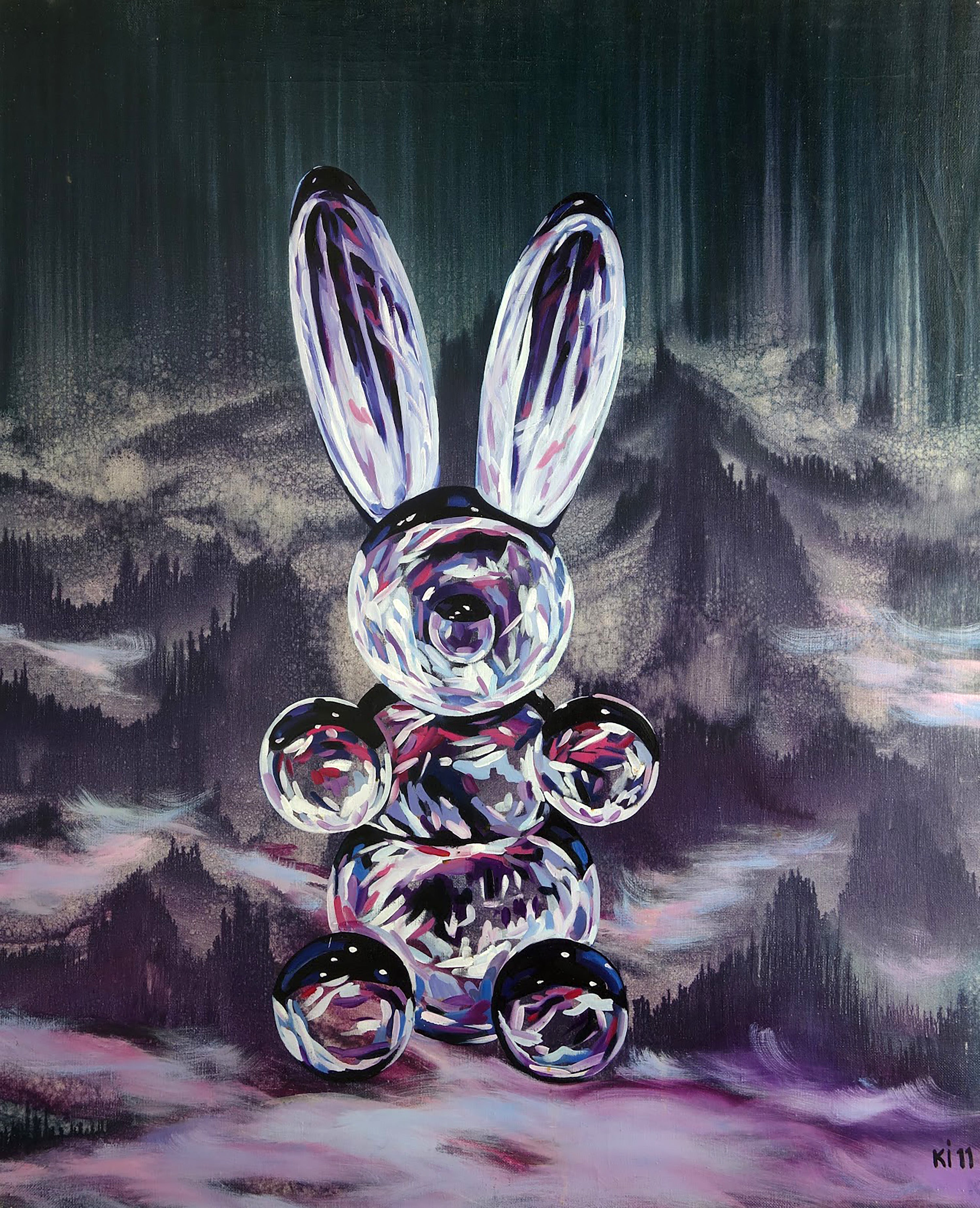 Glass rabbit sculpture with mountainous landscape background