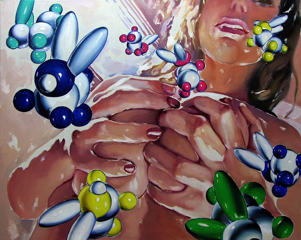 Close-up of a woman's hands with colorful molecular models around her