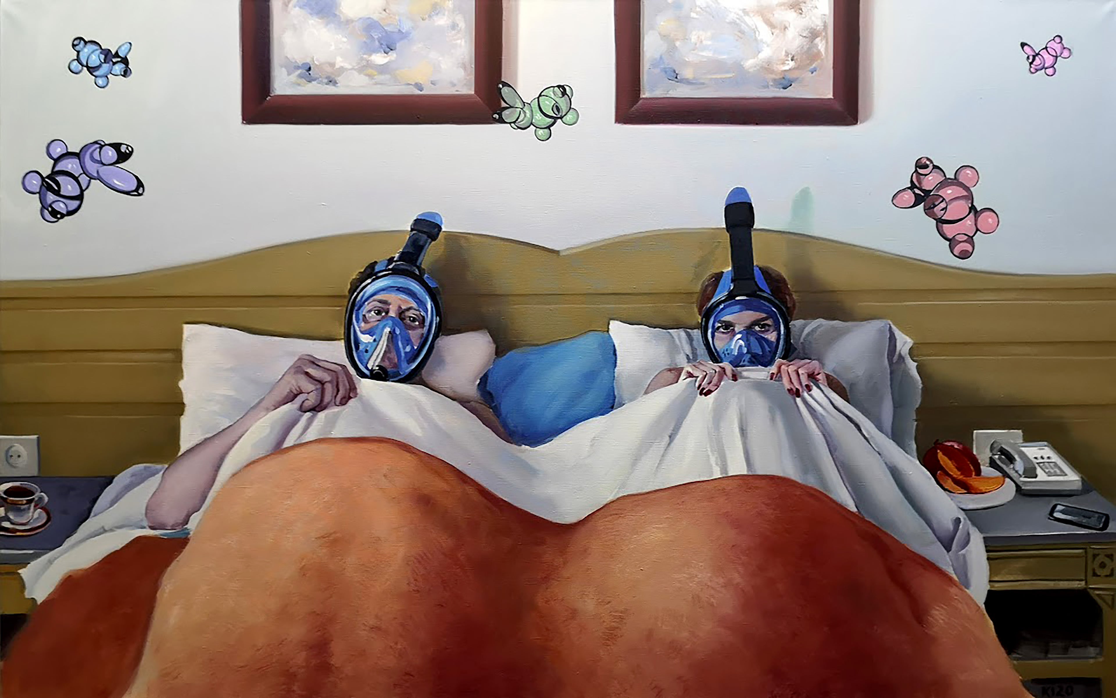 Two people in bed with snorkeling gear on, surrounded by butterfly decorations.