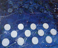 White circular patterns on a blue textured background