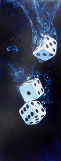 Three dice floating in water with a dark background
