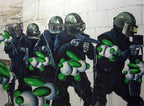 Mural of uniformed figures with green and white objects, possibly grenades, against a textured wall.