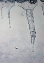 Icicles hanging from a roof with a light gray background