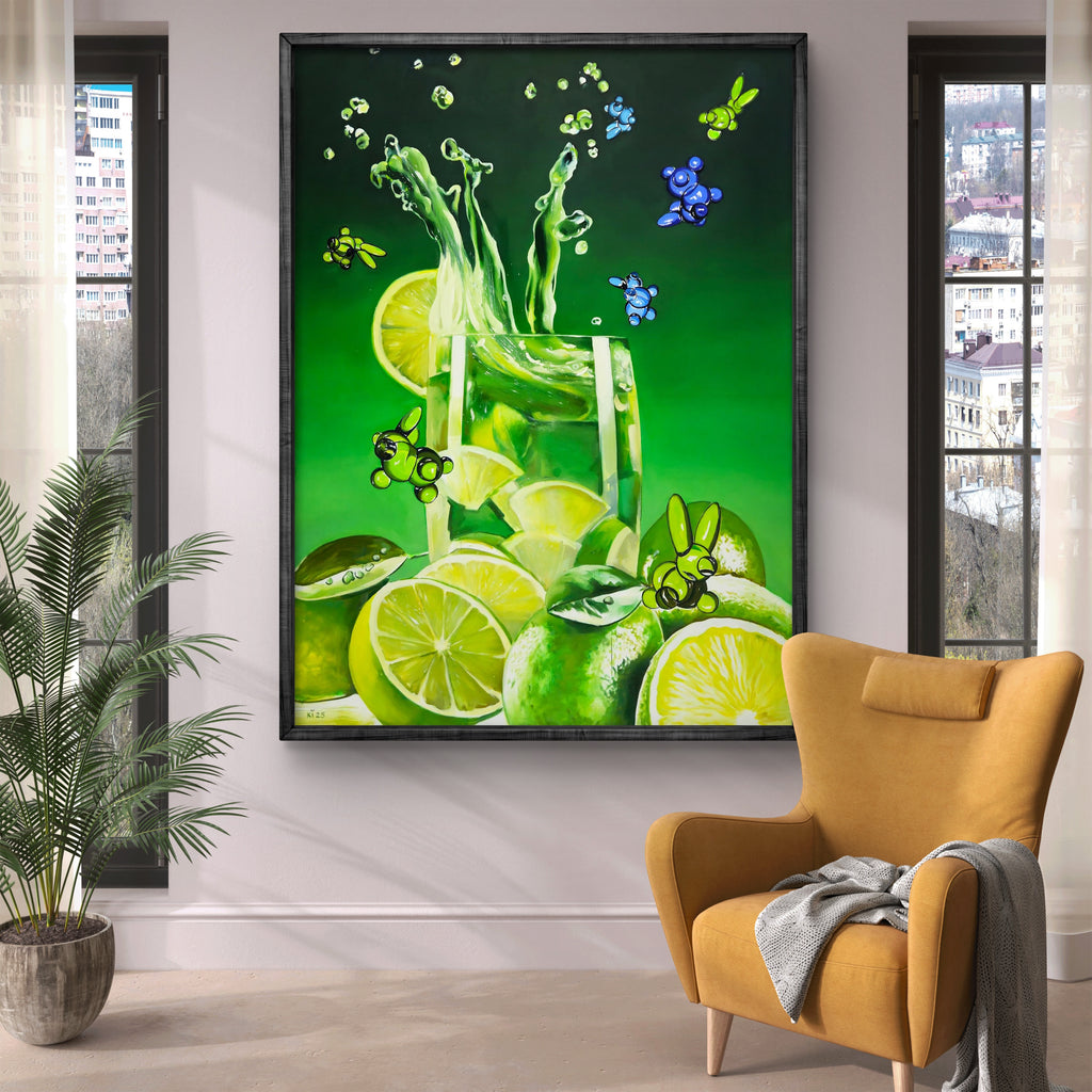 Framed artwork of a green drink with lime slices on a wall above a yellow armchair.