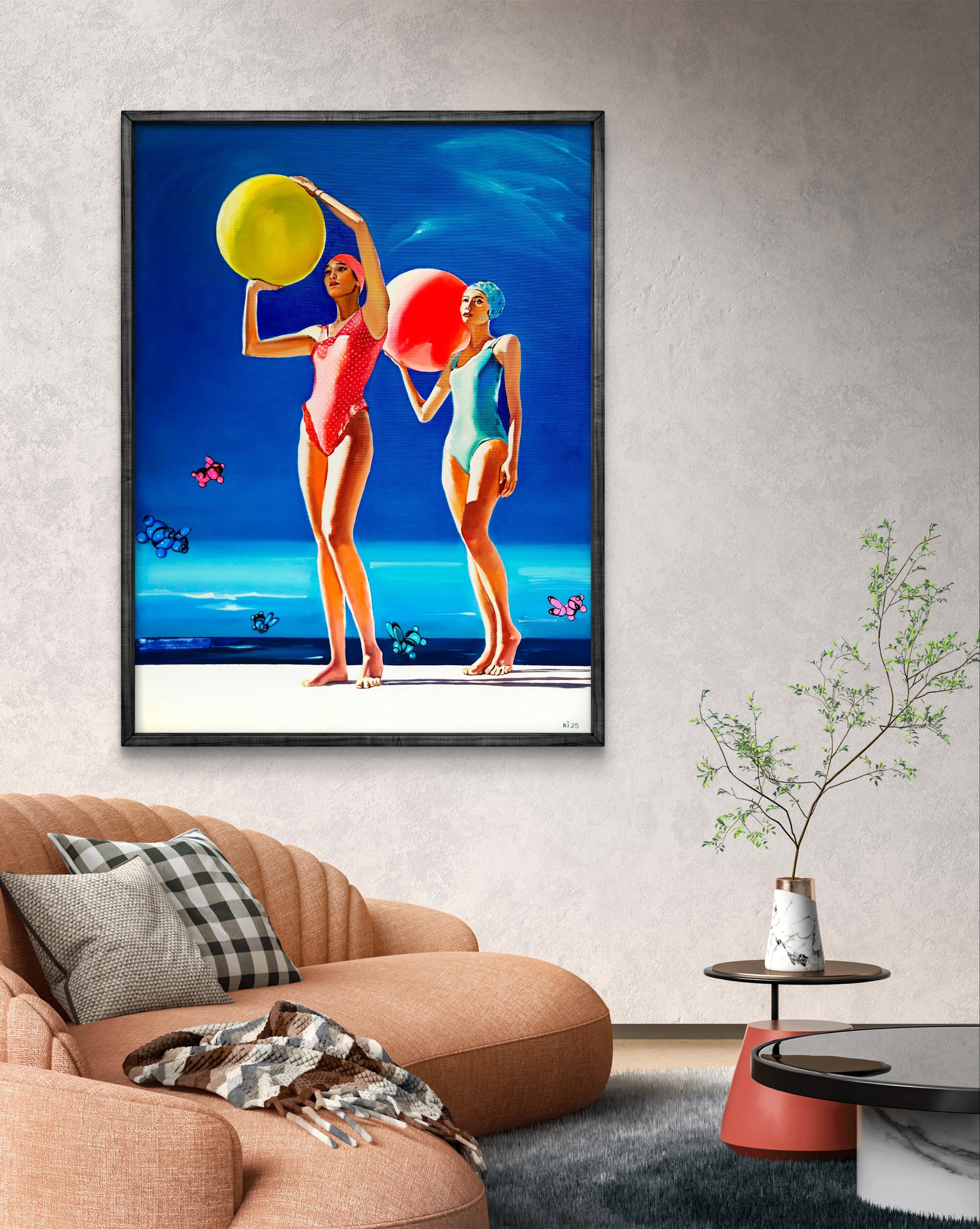 Framed artwork of two women at the beach with colorful balls in a living room.