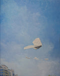 Paper airplane flying against a blue sky with buildings at the bottom