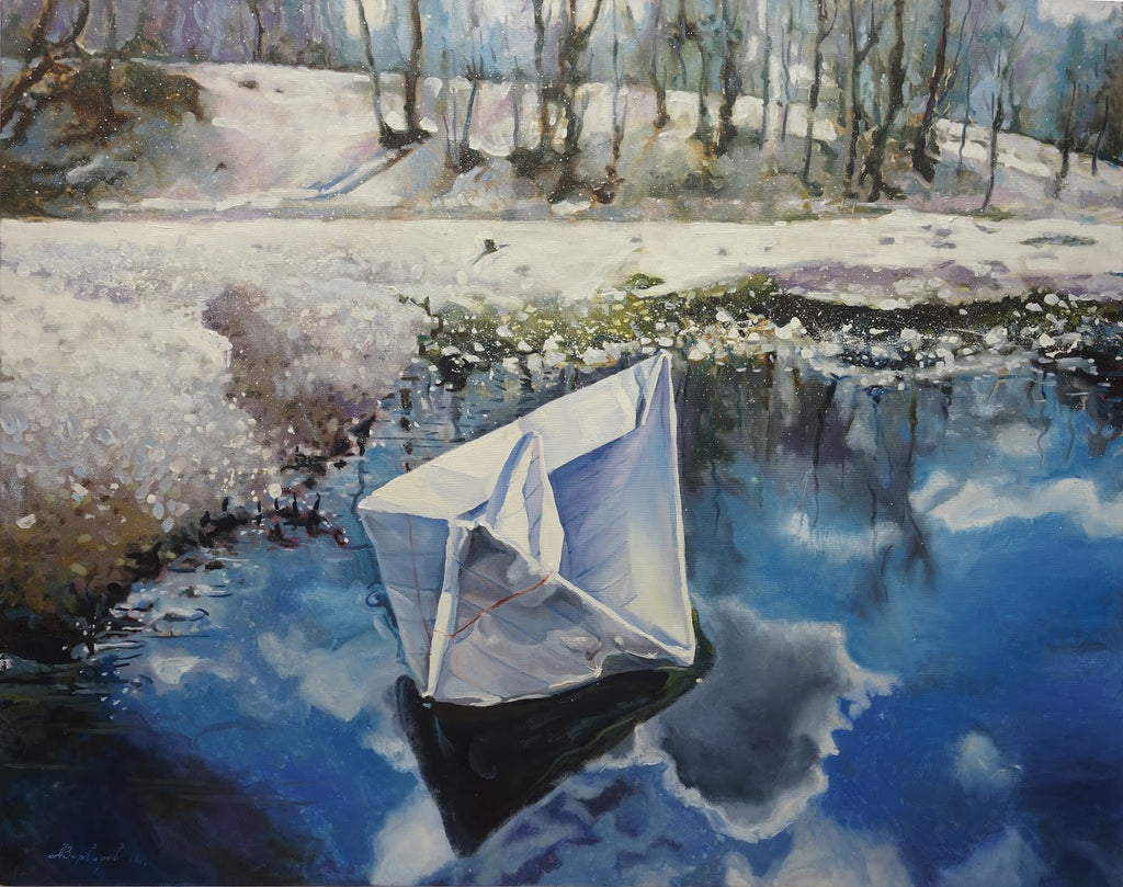 Paper boat floating on water with a snowy landscape in the background