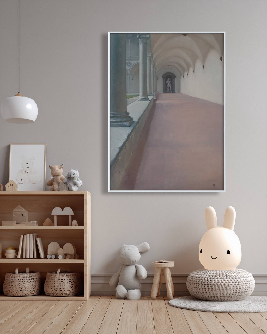 Nursery room with a large framed picture of a hallway, wooden shelf with toys, and a plush rabbit toy.