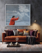 Living room with a brown sofa, decorative pillows, and a large framed painting on the wall.