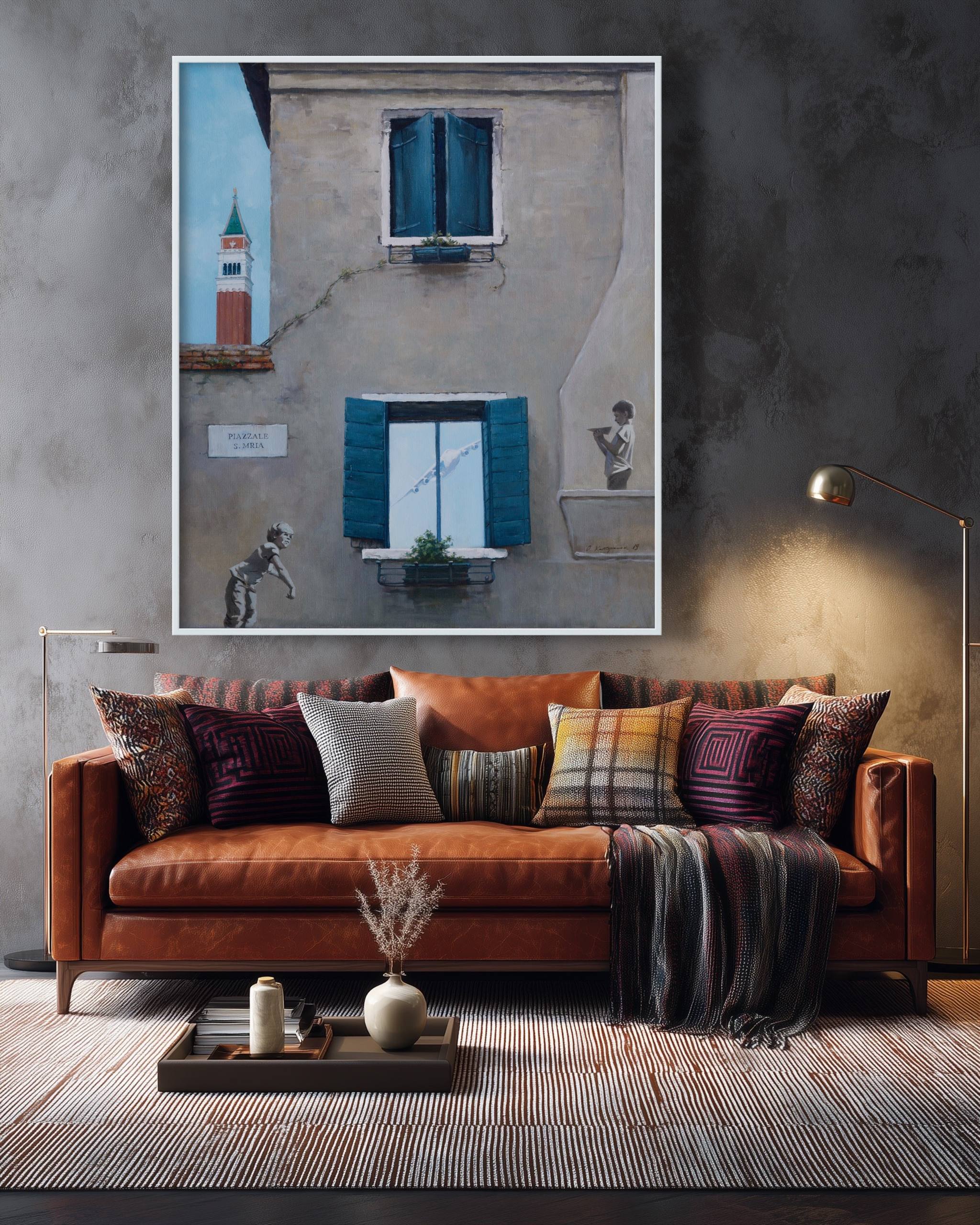 Cozy living room with brown sofa, decorative pillows, and a framed artwork on the wall.