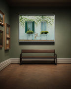 Framed artwork of a window scene with plants on a wall above a wooden bench.
