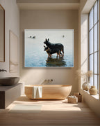 Modern bathroom with wooden bathtub and framed artwork of two dogs in water.