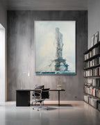 Modern office interior with a large framed painting of a statue on the wall.