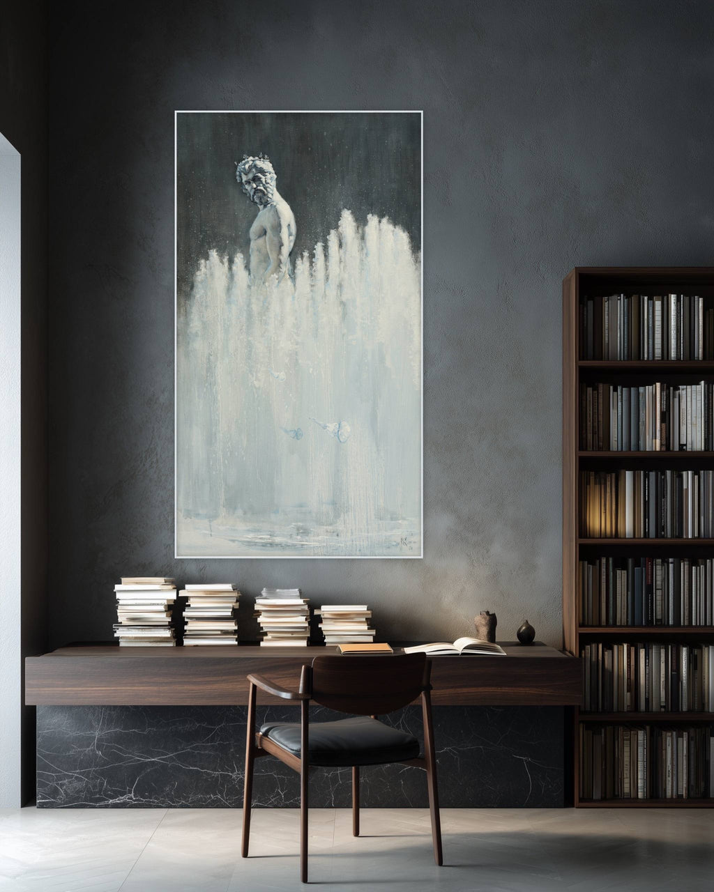 Modern office setup with a desk, chair, and large framed artwork on a dark wall.