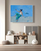 Framed artwork of a woman with fish on a wall above a shelf with decorative items.