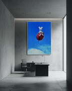 Modern office interior with a large abstract painting of a mouse on a balloon against a blue sky.