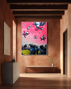 Colorful abstract painting on a wall in a modern interior setting