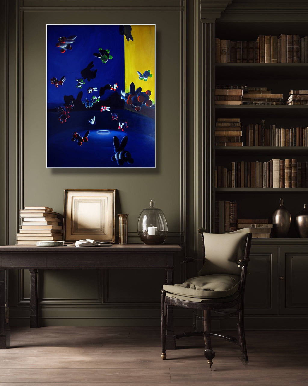 Colorful butterfly artwork on a wall in a room with a bookshelf and chair.