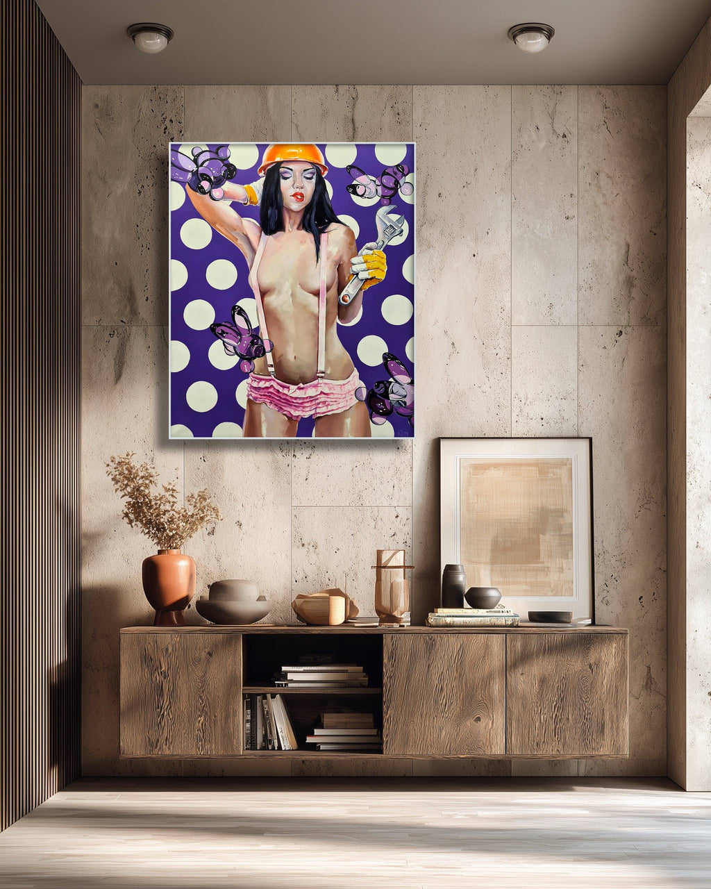 Modern interior with a painting of a woman in a polka dot dress on a wall.