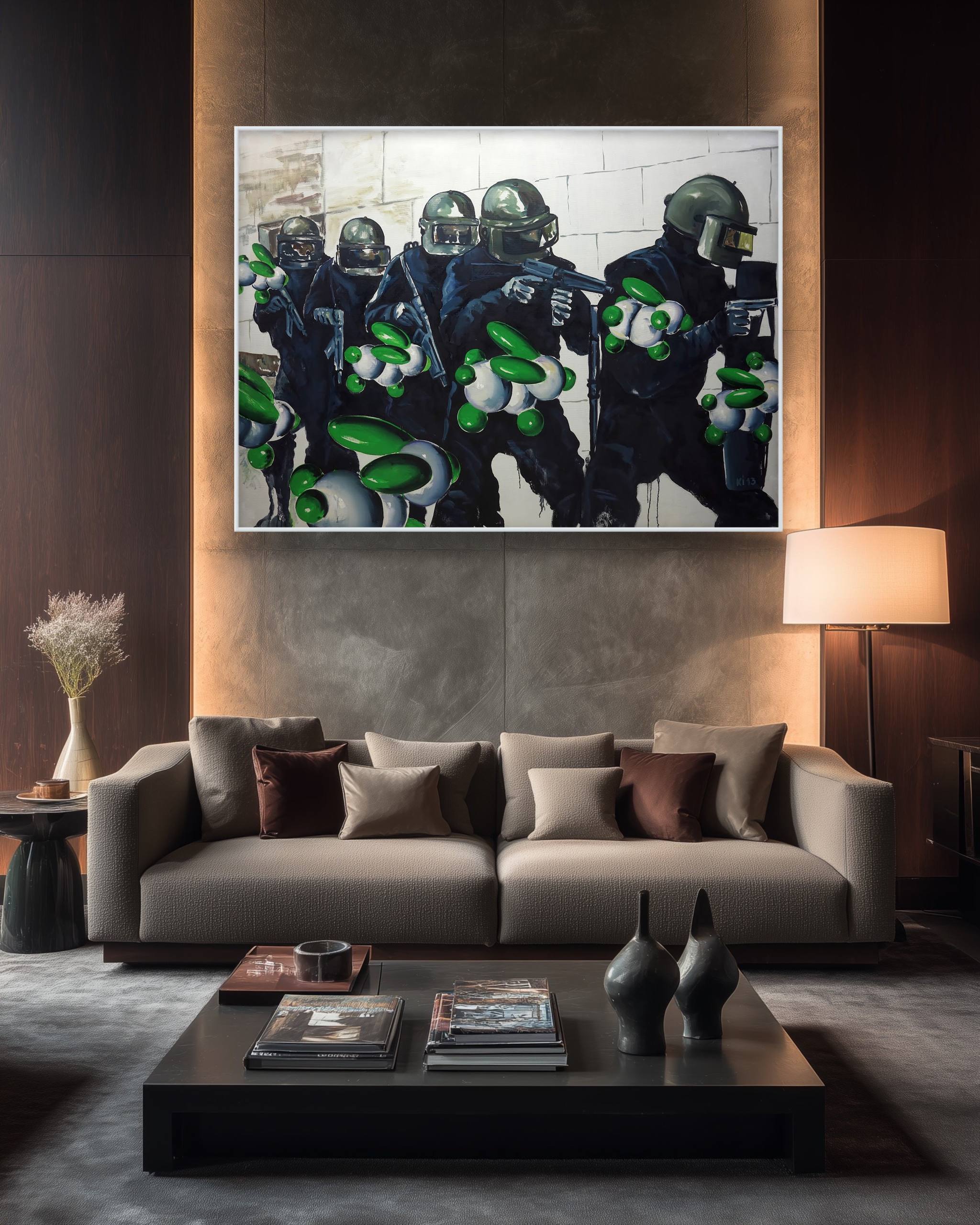 Modern living room with a gray sofa, coffee table, and artwork on the wall.