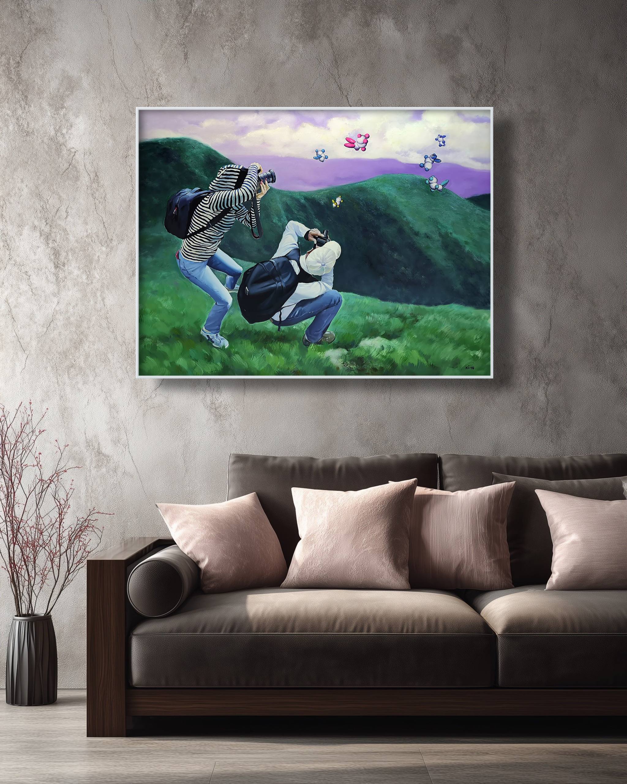 Framed artwork of a golfer on a green hillside with a purple sky, displayed above a brown sofa.