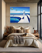 Modern bedroom with a large TV displaying an ocean scene above a bed.