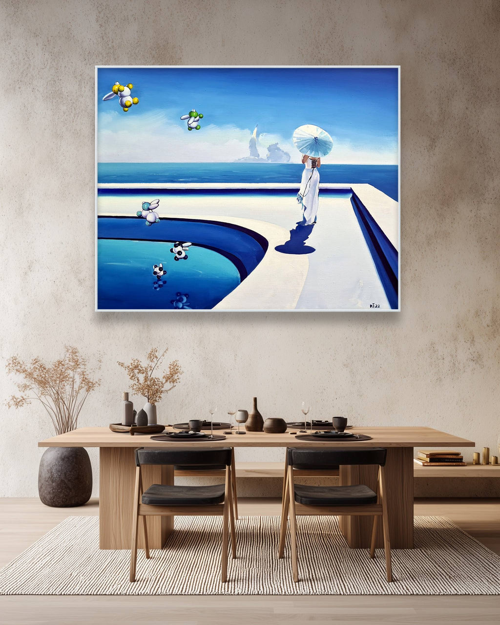 Dining room with a large abstract painting of a pool and sky on the wall.