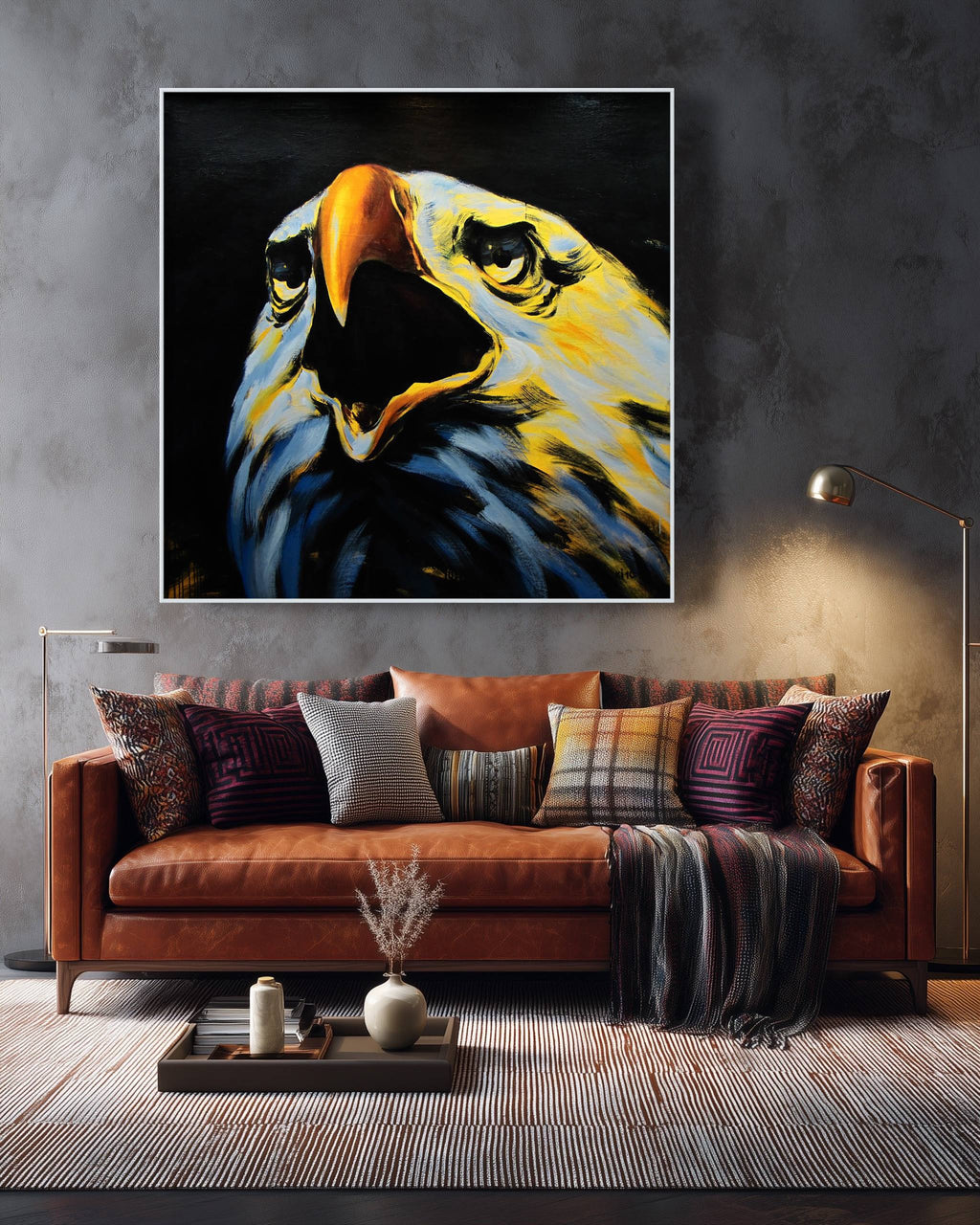 Eagle painting on a wall above a brown sofa with decorative pillows in a living room.