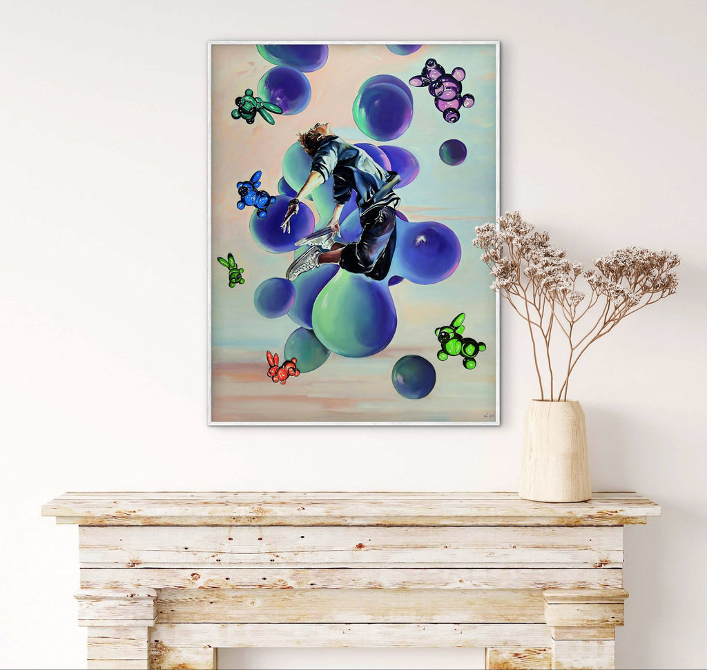 Colorful abstract painting on a wall above a wooden console table with a vase of dried flowers.