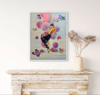 Framed artwork of a woman with balloons and butterflies on a wall above a wooden console table.