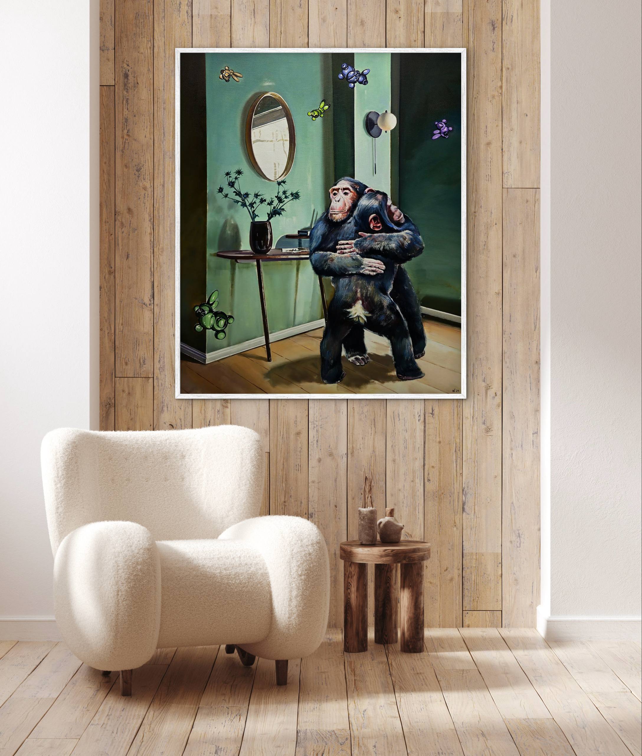 Framed artwork of a monkey holding a child in a room with wooden walls and a white armchair.