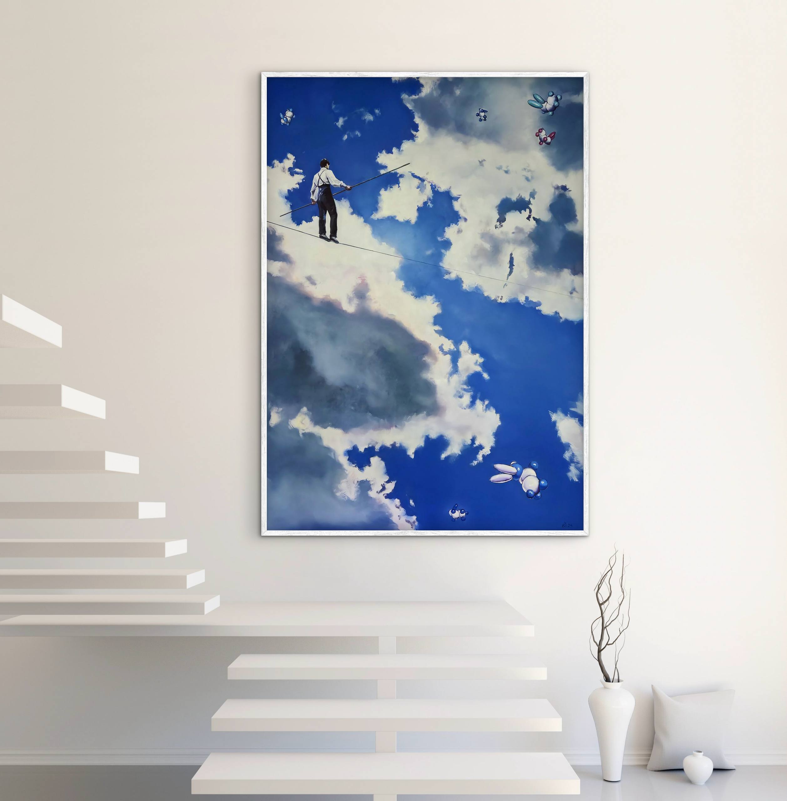 Framed artwork of a person on a cloud against a blue sky with clouds, displayed on a white wall.