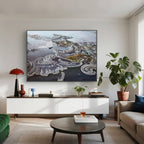 Modern living room with a large abstract painting on the wall, a white console table, and a green armchair.