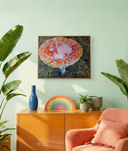 Living room with a colorful painting, decorative items, and a pink chair.