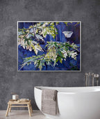 Bathroom with a large painting of a leafy branch on a gray wall above a white bathtub.