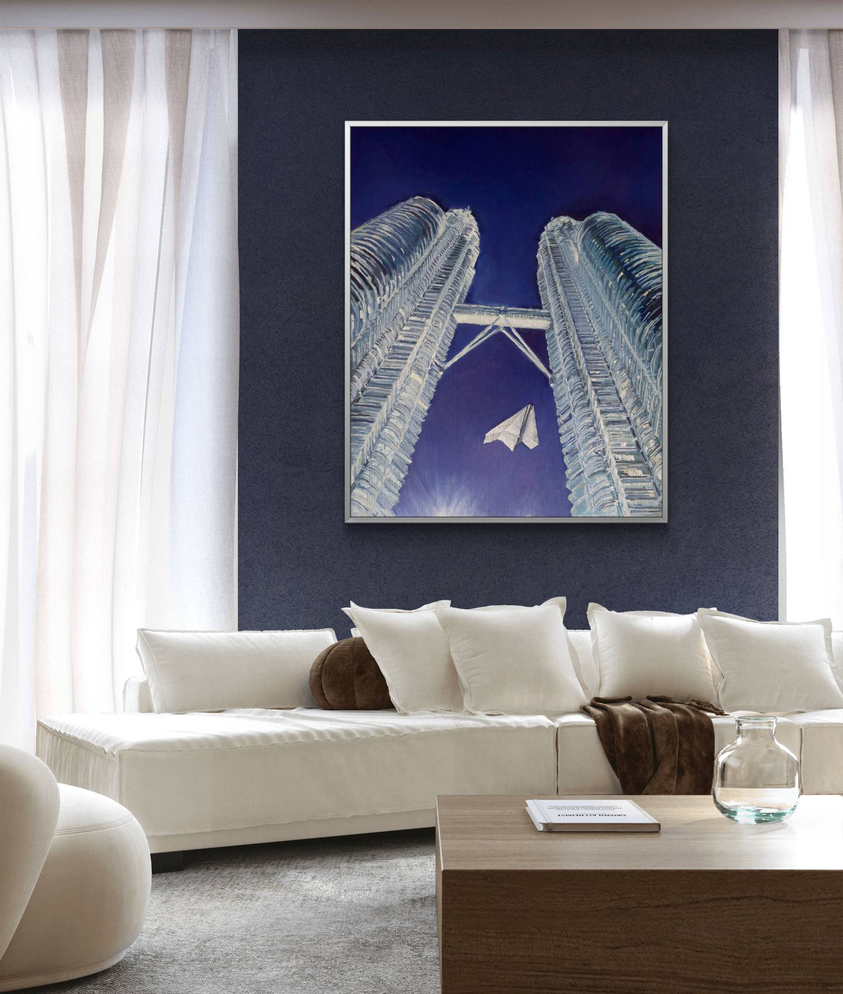 Modern living room with a white sofa, wooden coffee table, and abstract art on the wall.