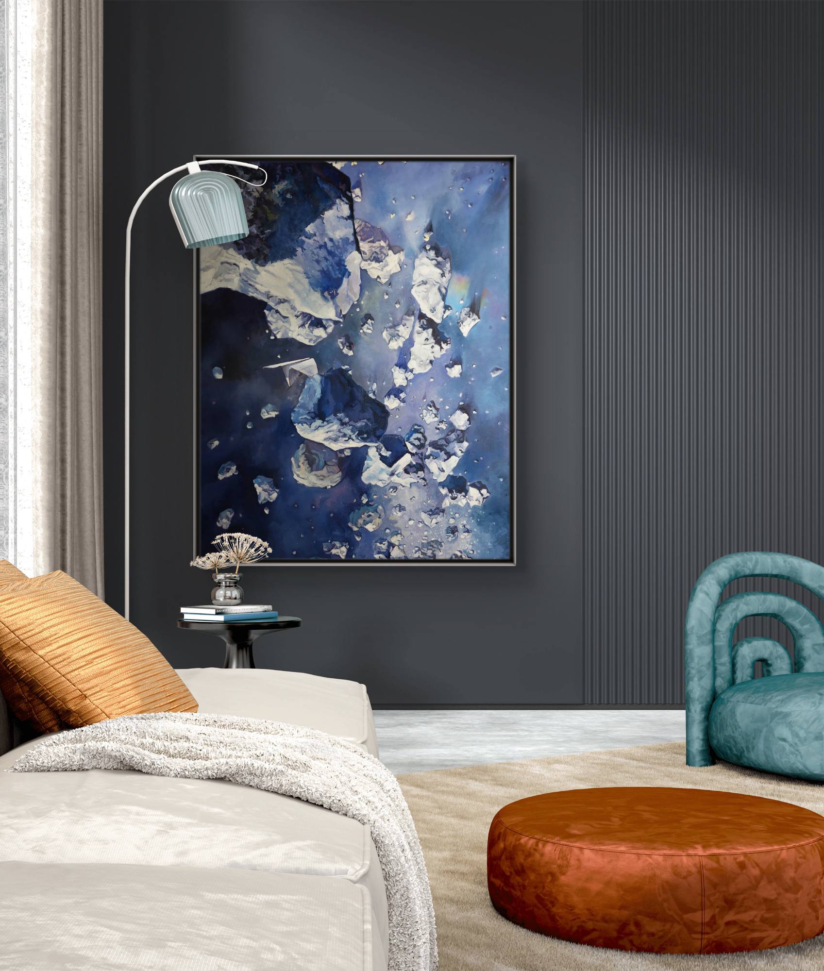 Modern living room with abstract art on the wall, a sofa, ottoman, and chair.