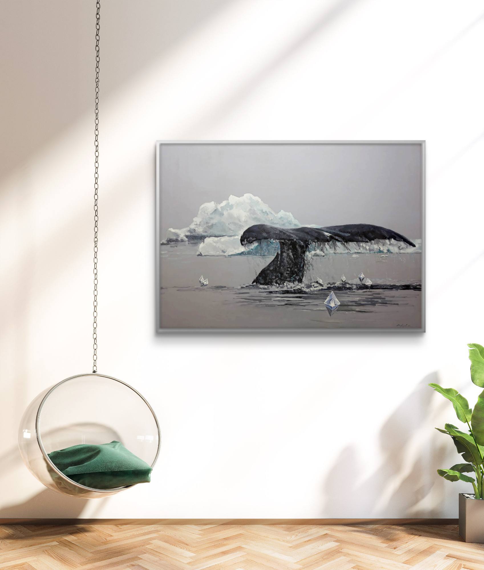 Framed artwork of a whale tail in an interior setting with a chair and plant.