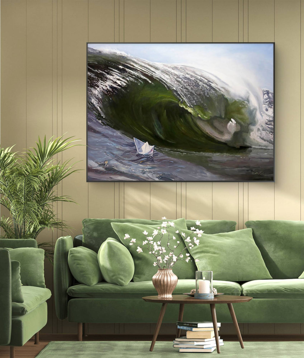 Living room with green sofa, decorative pillows, and a large TV displaying a wave scene.