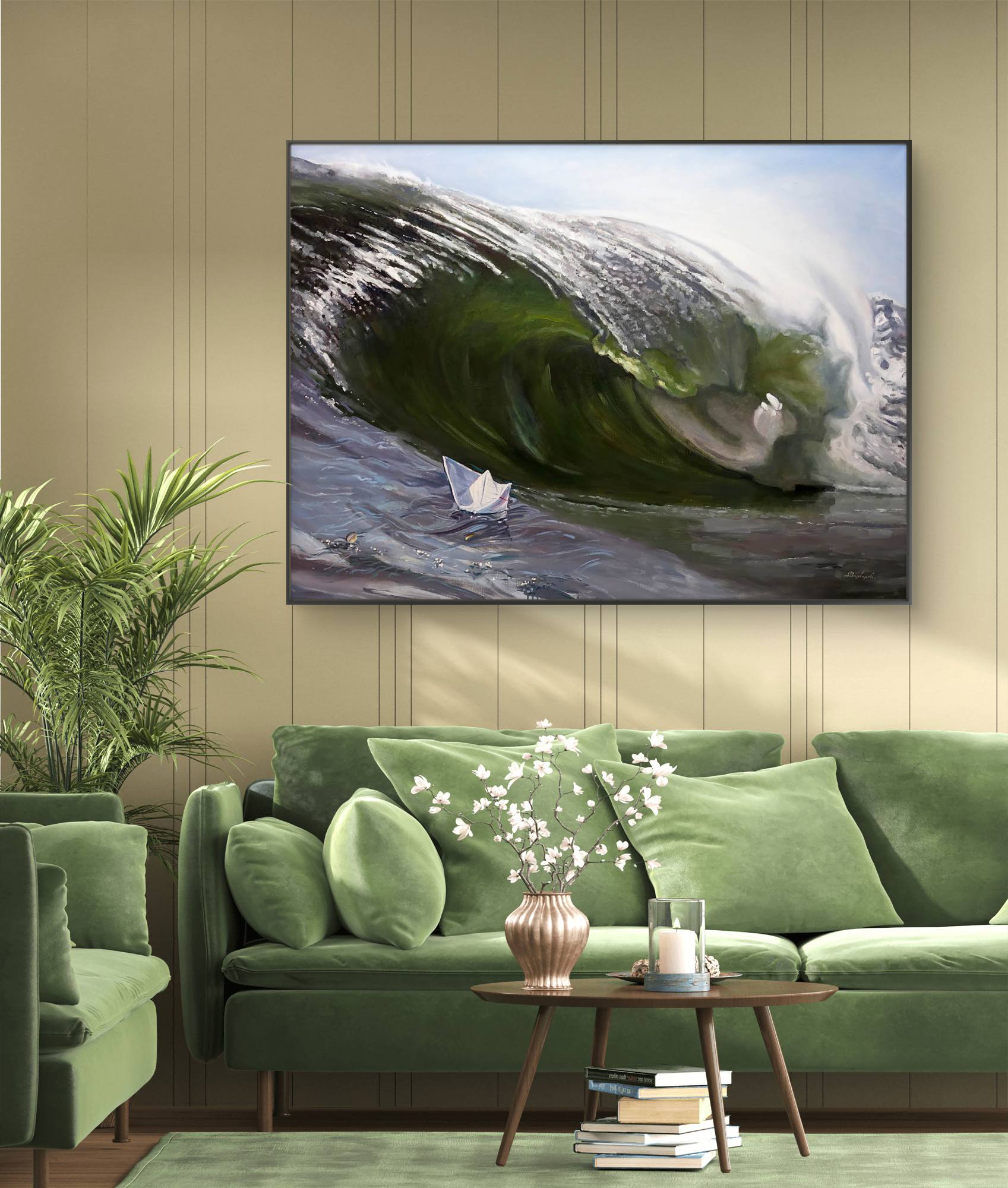 Living room with green sofa, decorative pillows, and a large TV displaying a wave scene.