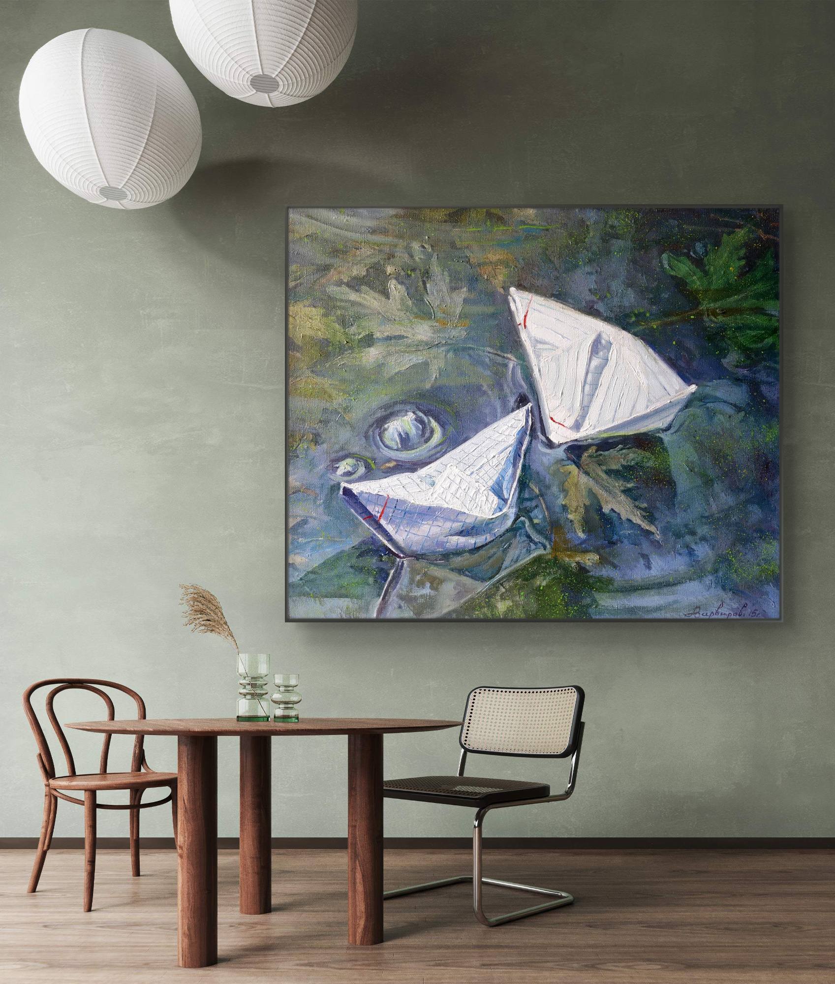 Dining room with a large abstract painting of two sailboats on a wall above a table.